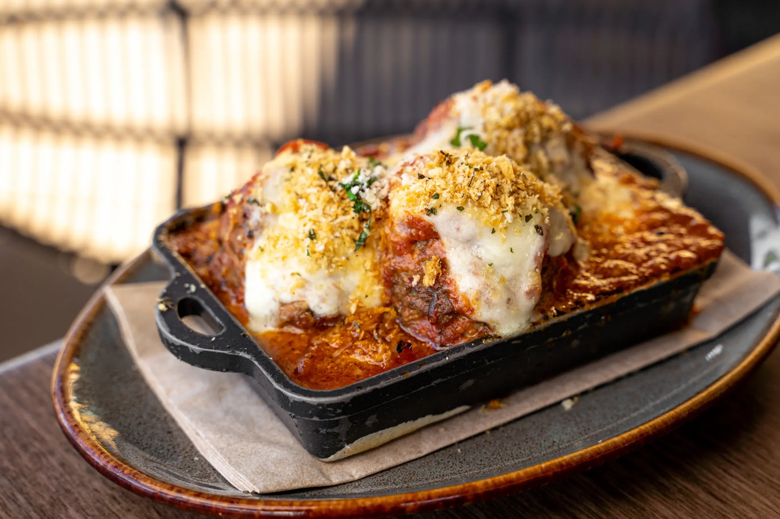 meatballs in marinara sauce in cast iron skillet 