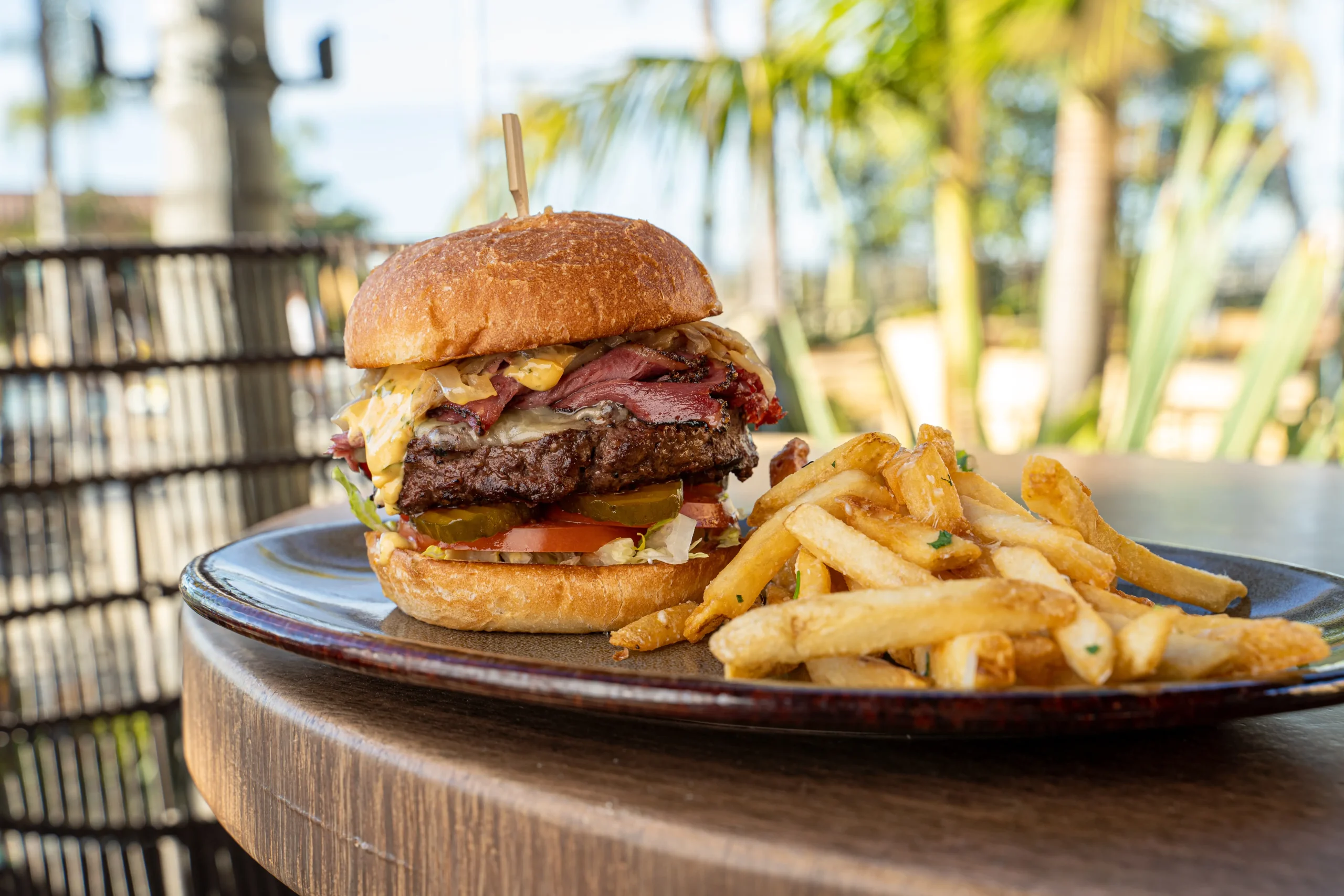 Beef bacon and cheese burger with fries